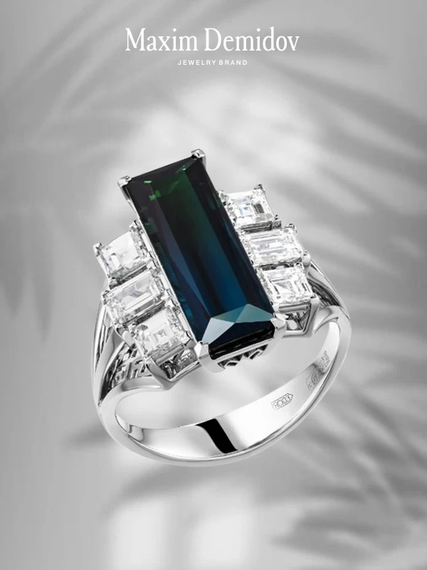 <p><em>На фото: кольцо с турмалином Индиголит в огранке «багет» <a href="https://maxim-demidov.ru/products/kolco-tainstvennost-polunochi" target="_blank">«Таинственность полуночи»</a> от Ювелирного дома Maxim Demidov</em></p>
